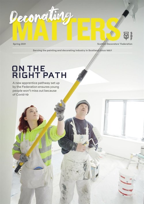 Cover, Decorating Matters magazine - Spring 2021. An apprentice takes care painting a ceiling with a long handled roller